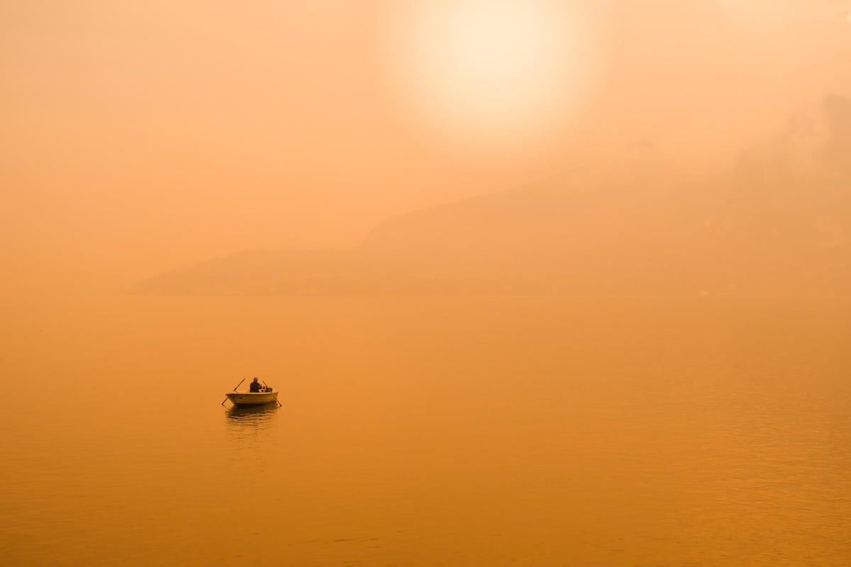 Man in boat on lake